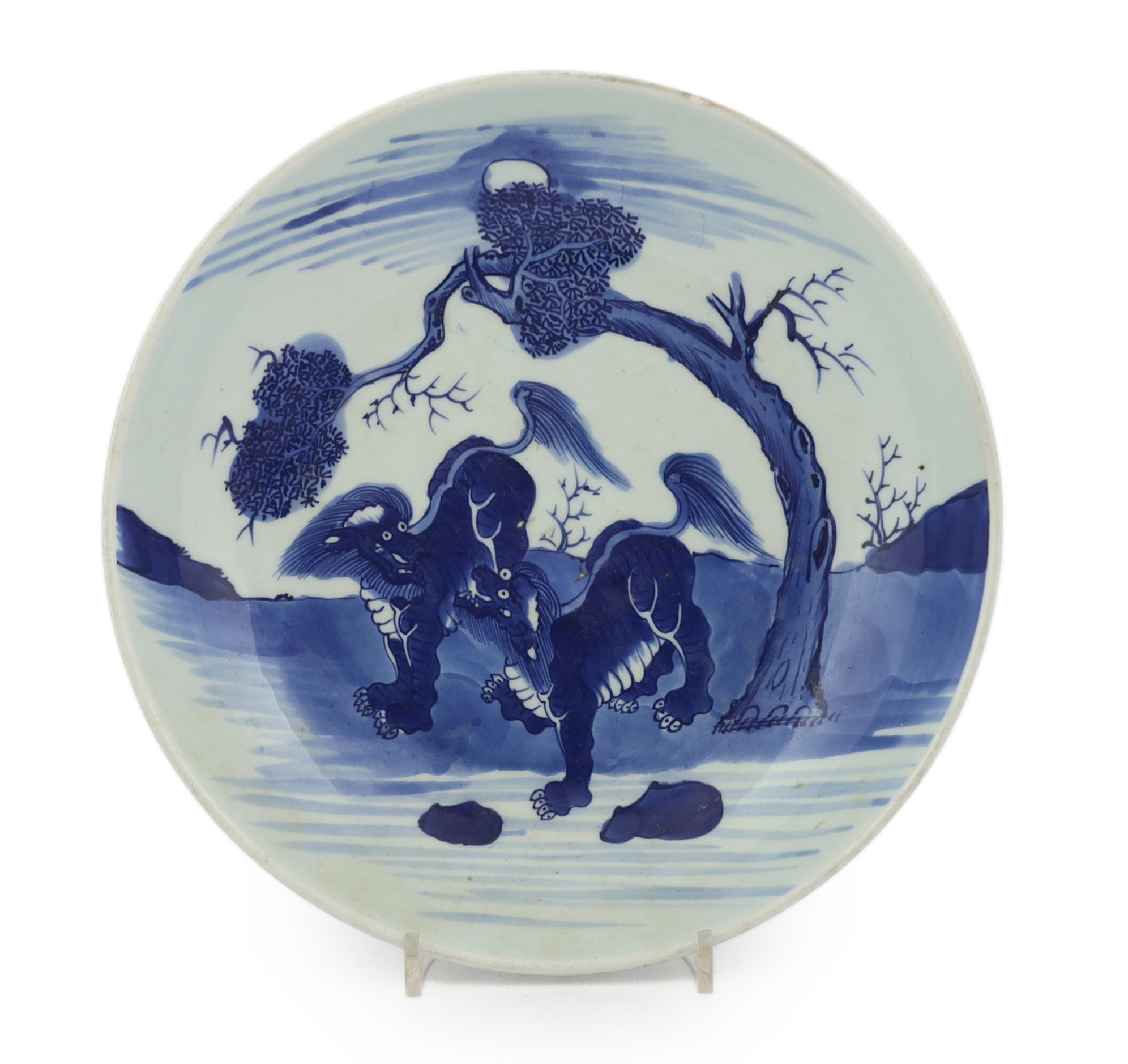 A large Chinese blue and white ‘mythical beasts’ saucer dish, Yongzheng period